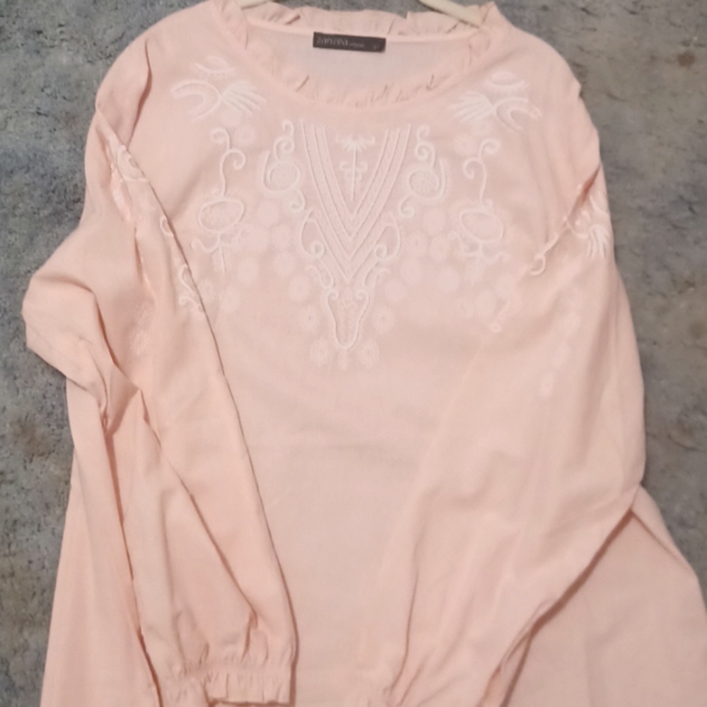 Long sleeved embroidered blouse never worn. No stains or rips.